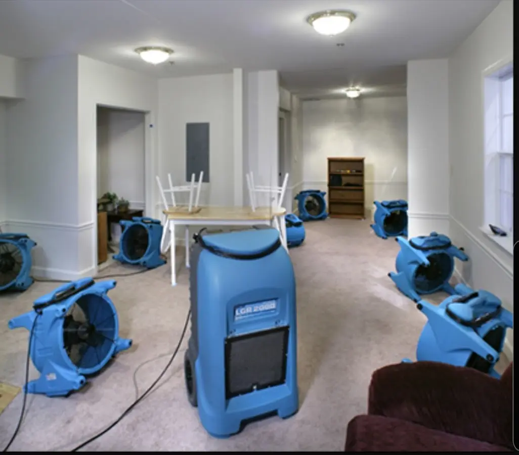 Air movers and dehumidifier setup for Water Damage Restoration in Columbia Heights